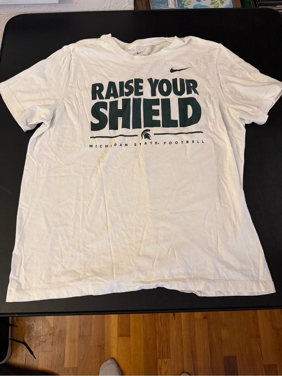 Nike Other - Nike White Short-Sleeve 'Raise Your Shield' Graphic Tee with Green Print
